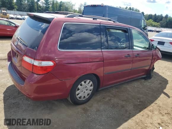2005 Honda Odyssey LX with VIN 5FNRL38255B095685, listed as a Copart auction lot 70669745 with 165,391 mi miles and Salvage title. Bid and sale history available at DreamBid. Image 3.
