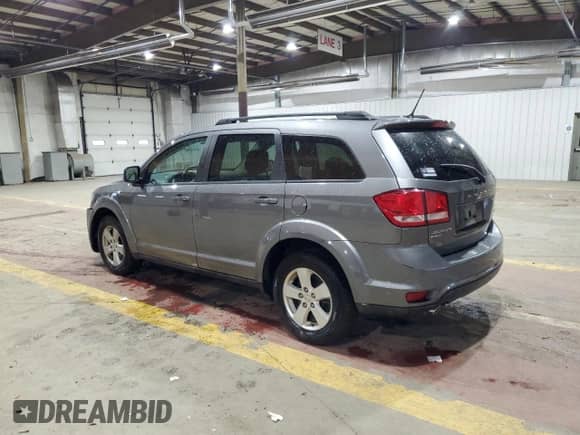 2012 Dodge Journey SXT z VIN 3C4PDDBG7CT397475, wystawiony jako Copart lot #86497885 z przebiegiem 44 137 mil mil oraz Szkoda całkowita • Salvage title. Historia ofert i sprzedaży dostępna na DreamBid. Obrazek 2.