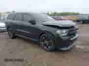 2013 Dodge Durango R/T with VIN 1C4SDJCT8DC638056, listed as a IAAI auction lot 42260663 with 201,316 mi miles and . Bid and sale history available at DreamBid. Image 1.