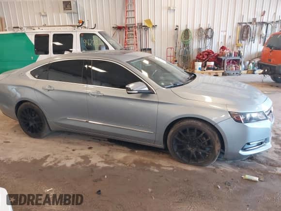 2014 Chevrolet Impala LTZ z VIN 1G1155S3XEU137403, wystawiony jako IAAI lot #43168544 z przebiegiem 110 226 mil mil oraz . Historia ofert i sprzedaży dostępna na DreamBid. Obrazek 13.