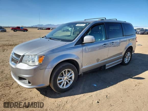 2018 Dodge Grand Caravan SXT with VIN 2C4RDGCG5JR265517, listed as a Copart auction lot 80088115 with 152,680 mi miles and Salvage title. Bid and sale history available at DreamBid. Image 1.