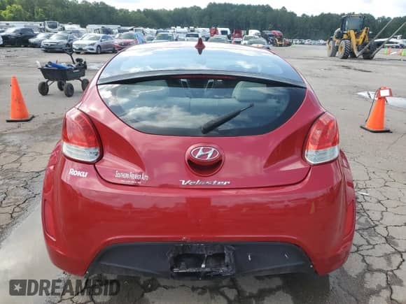 2013 Hyundai Veloster w/Gray Int z VIN KMHTC6AD8DU087858, wystawiony jako Copart lot #61438185 z przebiegiem Nie podano mil oraz Szkoda całkowita • Salvage title. Historia ofert i sprzedaży dostępna na DreamBid. Obrazek 6.