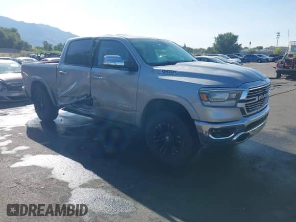 2019 Ram 1500 Laramie z VIN 1C6SRFJTXKN516700, wystawiony jako IAAI lot #43223624 z przebiegiem 75 378 mil mil oraz . Historia ofert i sprzedaży dostępna na DreamBid. Obrazek 1.