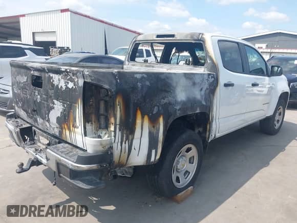 2021 Chevrolet Colorado 4WD Work Truck z VIN 1GCGTBEN1M1100422, wystawiony jako IAAI lot #42340467 z przebiegiem 87 158 mil mil oraz . Historia ofert i sprzedaży dostępna na DreamBid. Obrazek 4.