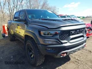 2022 Ram 1500 TRX with VIN 1C6SRFU99NN311731, listed as a IAAI auction lot 41857579 with 20,627 mi miles and . Bid and sale history available at DreamBid. Image 1.