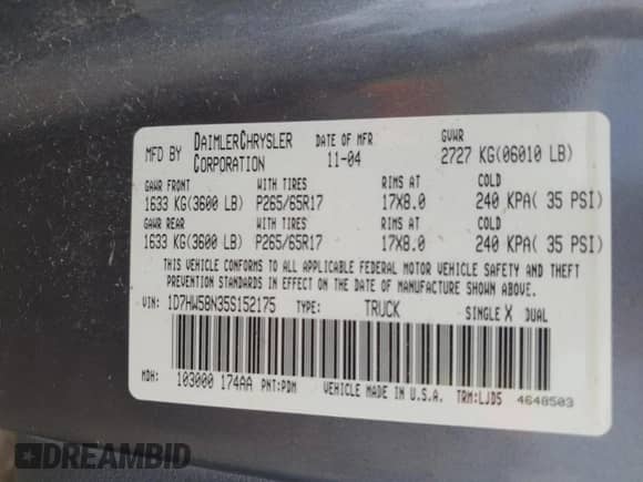 2005 Dodge Dakota Laramie z VIN 1D7HW58N35S152175, wystawiony jako Copart lot #61299295 z przebiegiem 221 812 mil mil oraz Nie do naprawy • Non repairable. Historia ofert i sprzedaży dostępna na DreamBid. Obrazek 13.