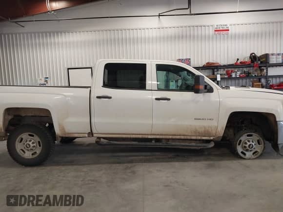2016 Chevrolet Silverado 2500HD Work Truck with VIN 1GC1KUE80GF124569, listed as a IAAI auction lot 42915578 with 115,052 mi miles and . Bid and sale history available at DreamBid. Image 13.