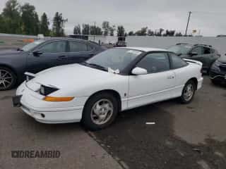 1995 Saturn 2dr Coupe с VIN 1G8ZH127XSZ326509, выставлен на аукционе Copart как лот 77352434 с пробегом 108 990 миль миль и Чистый • Clean title. История ставок и продаж доступна на DreamBid. Изображение 1.