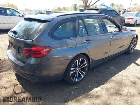 2018 BMW 3 Series 330i xDrive with VIN WBA8K3C56JA483718, listed as a IAAI auction lot 42127605 with 93,852 mi miles and . Bid and sale history available at DreamBid. Image 4.