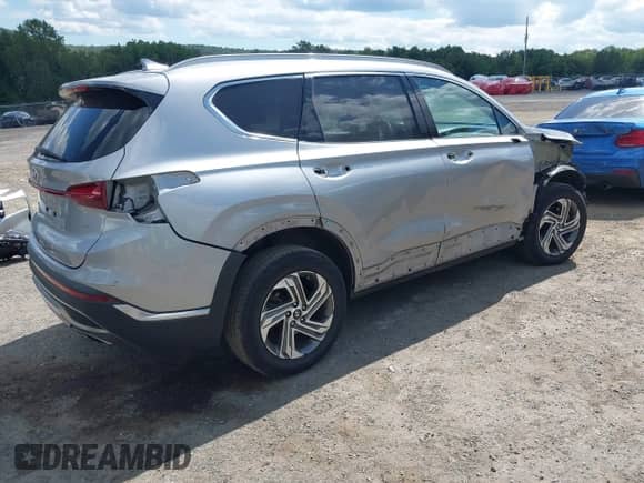 2021 Hyundai Santa Fe SEL z VIN 5NMS2DAJ6MH350076, wystawiony jako IAAI lot #43116374 z przebiegiem 45 457 mil mil oraz . Historia ofert i sprzedaży dostępna na DreamBid. Obrazek 4.