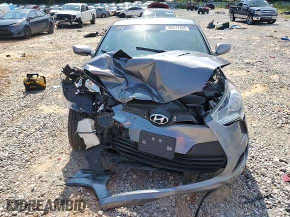 2012 Hyundai Veloster w/Black Int z VIN KMHTC6AD7CU028864, wystawiony jako Copart lot #66377895 z przebiegiem 130 440 mil mil oraz Szkoda całkowita • Salvage title. Historia ofert i sprzedaży dostępna na DreamBid. Obrazek 5.