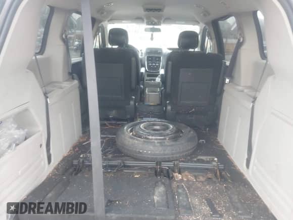 2013 Dodge Grand Caravan SXT with VIN 2C4RDGCG3DR749402, listed as a IAAI auction lot 43412961 with 265,451 mi miles and . Bid and sale history available at DreamBid. Image 12.