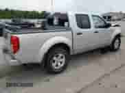 2009 Nissan Frontier SE z VIN 1N6AD07W49C401899, wystawiony jako Copart lot #63249925 z przebiegiem 323 611 mil mil oraz Szkoda całkowita • Salvage title. Historia ofert i sprzedaży dostępna na DreamBid. Obrazek 3.