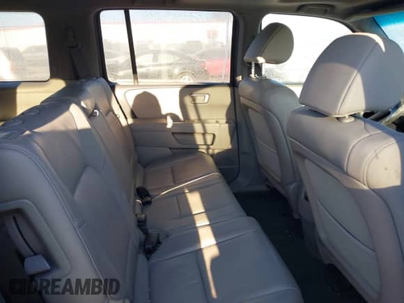 2014 Honda Pilot EX-L with VIN 5FNYF4H70EB002480, listed as a IAAI auction lot 41407191 with 284,659 mi miles and . Bid and sale history available at DreamBid. Image 8.