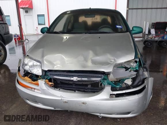 2004 Chevrolet Aveo with VIN KL1TD52664B200365, listed as a IAAI auction lot 41904540 with 104,440 mi miles and . Bid and sale history available at DreamBid. Image 12.