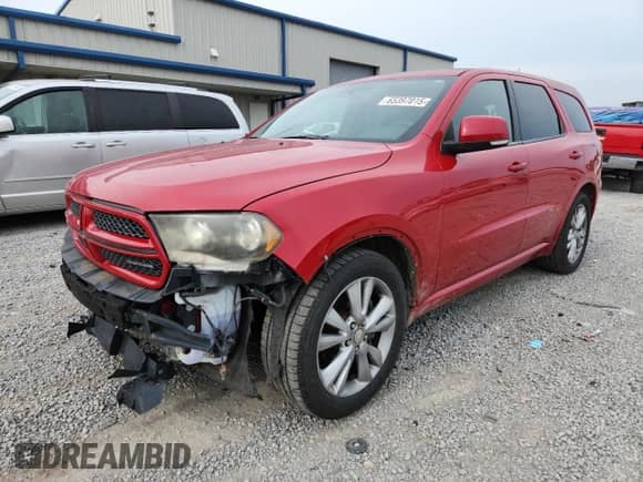 2012 Dodge Durango R/T with VIN 1C4SDJCT3CC116577, listed as a Copart auction lot 65397015 with 157,732 mi miles and Salvage title. Bid and sale history available at DreamBid. Image 1.