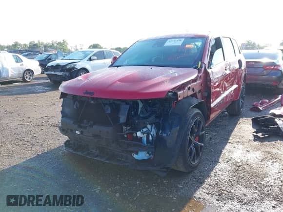 2021 Jeep Grand Cherokee SRT with VIN 1C4RJFDJ1MC818352, listed as a IAAI auction lot 42937368 with 37,574 mi miles and . Bid and sale history available at DreamBid. Image 6.