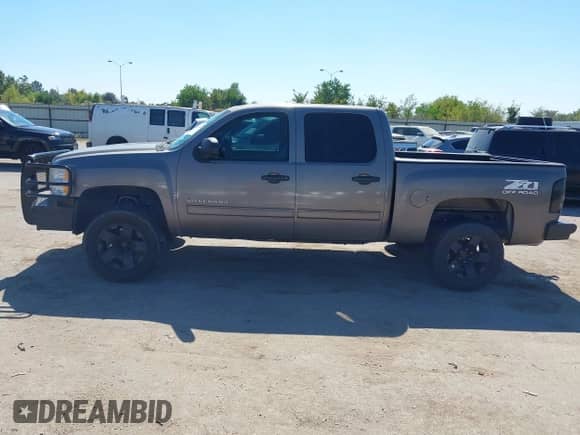 2012 Chevrolet Silverado 1500 LT with VIN 3GCPKSE74CG260038, listed as a IAAI auction lot 43452788 with 208,113 mi miles and . Bid and sale history available at DreamBid. Image 14.
