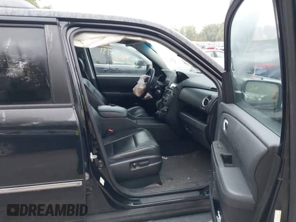 2013 Honda Pilot Touring with VIN 5FNYF4H97DB047819, listed as a IAAI auction lot 43299908 with 253,413 mi miles and . Bid and sale history available at DreamBid. Image 5.