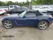 2009 Saturn Sky Red Line with VIN 1G8MT35X09Y105064, listed as a IAAI auction lot 42197028 with 106,673 mi miles and . Bid and sale history available at DreamBid. Image 14.
