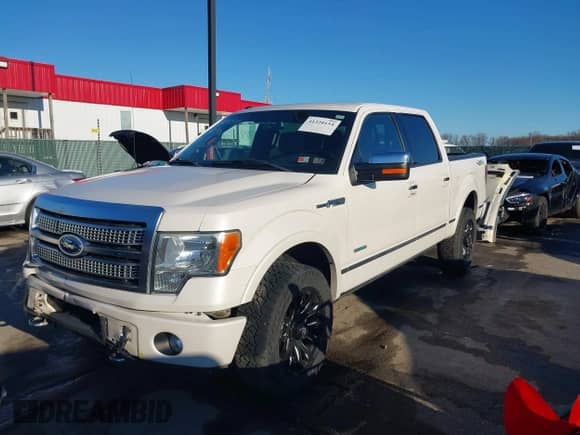 2011 Ford F-150 XLT z VIN 1FTFW1ETXBFB21698, wystawiony jako IAAI lot #41320154 z przebiegiem 119 765 mil mil oraz . Historia ofert i sprzedaży dostępna na DreamBid. Obrazek 2.