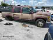 1995 Chevrolet Suburban z VIN 1GNFK16K6SJ427156, wystawiony jako Copart lot #71663775 z przebiegiem 380 713 mil mil oraz Szkoda całkowita • Salvage title. Historia ofert i sprzedaży dostępna na DreamBid. Obrazek 4.