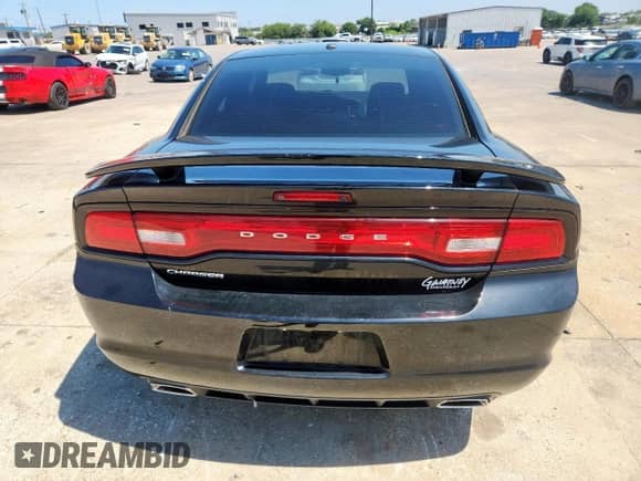 2013 Dodge Charger SXT z VIN 2C3CDXHG1DH502243, wystawiony jako Copart lot #60797055 z przebiegiem 105 632 mil mil oraz Szkoda całkowita • Salvage title. Historia ofert i sprzedaży dostępna na DreamBid. Obrazek 6.
