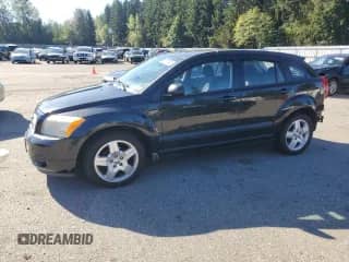 2009 Dodge Caliber SXT with VIN 1B3HB48A39D130816, listed as a Copart auction lot 82270345 with 106,380 mi miles and Salvage title. Bid and sale history available at DreamBid. Image 1.