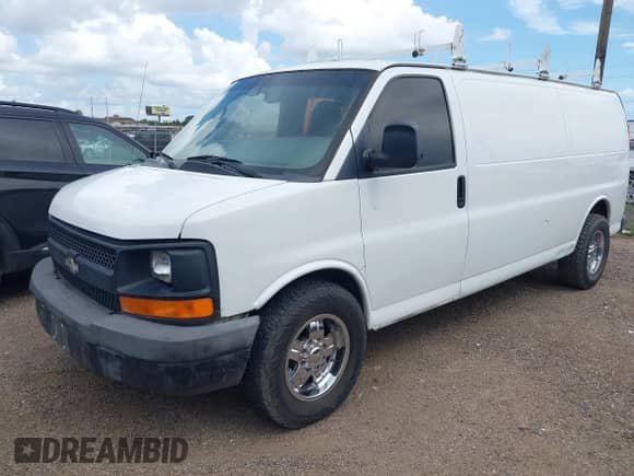 2014 Chevrolet Express Cargo with VIN 1GCWGGBA8E1122630, listed as a IAAI auction lot 42695749 with 208,291 mi miles and . Bid and sale history available at DreamBid. Image 2.