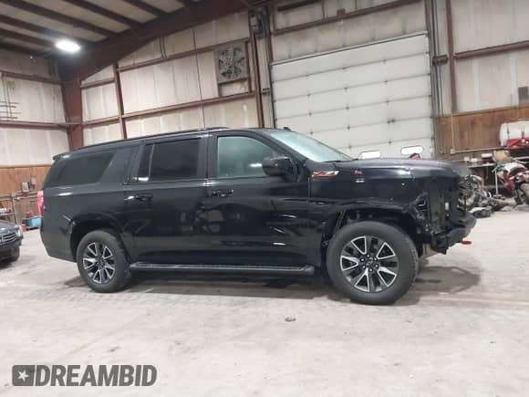 2022 Chevrolet Suburban Z71 с VIN 1GNSKDKD9NR250938, выставлен на аукционе IAAI как лот 41869425 с пробегом 77 214 миль миль и . История ставок и продаж доступна на DreamBid. Изображение 14.