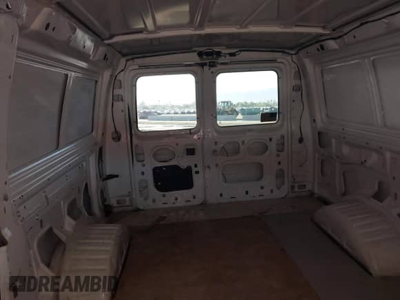 2003 Ford Econoline Cargo Commercial with VIN 1FTSE34L43HA23853, listed as a IAAI auction lot 43480589 with 143,062 mi miles and . Bid and sale history available at DreamBid. Image 8.