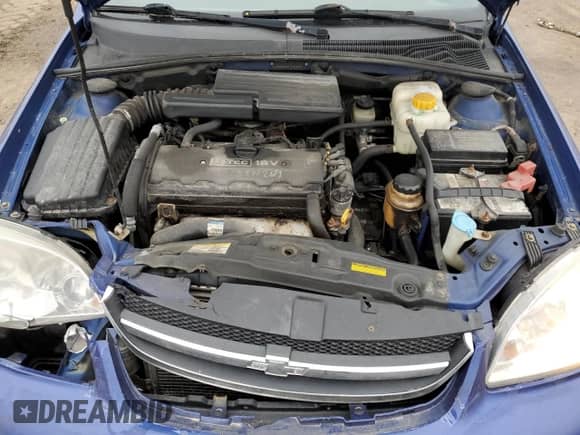 2005 Chevrolet Optra LS с VIN KL1JK59Z85K144184, выставлен на аукционе Copart как лот 48537625 с пробегом 346 711 миль миль и Списание • Salvage title. История ставок и продаж доступна на DreamBid. Изображение 11.