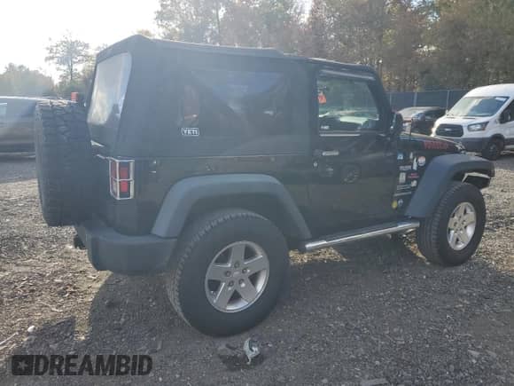 2012 Jeep Wrangler Sport with VIN 1C4AJWAG4CL237299, listed as a Copart auction lot 82743155 with 226,287 mi miles and Clean title. Bid and sale history available at DreamBid. Image 3.