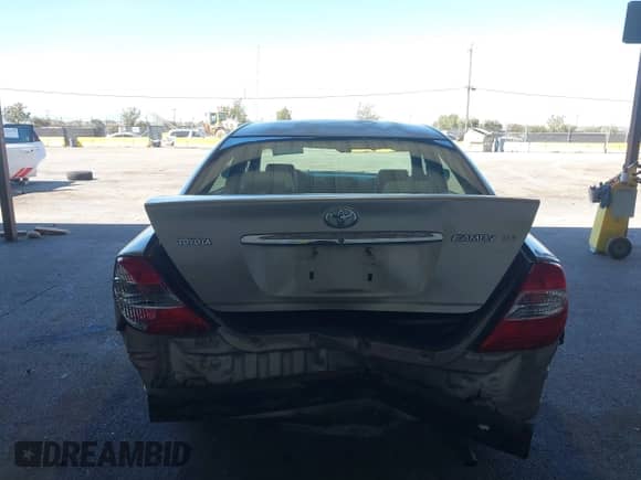 2002 Toyota Camry LE z VIN JTDBE32K320136619, wystawiony jako IAAI lot #42821050 z przebiegiem 165 174 mil mil oraz . Historia ofert i sprzedaży dostępna na DreamBid. Obrazek 6.