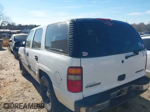 2003 Chevrolet Tahoe LS z VIN 1GNEC13Z63R140932, wystawiony jako IAAI lot #41703060 z przebiegiem 345 133 mil mil oraz . Historia ofert i sprzedaży dostępna na DreamBid. Obrazek 3.