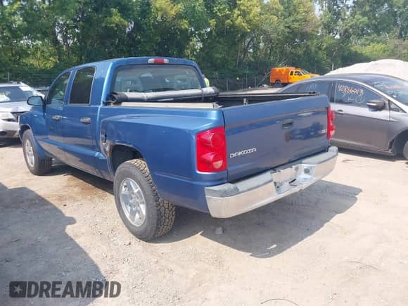 2006 Dodge Dakota SLT with VIN 1D7HW48K96S504631, listed as a IAAI auction lot 42885816 with 183,474 mi miles and . Bid and sale history available at DreamBid. Image 3.