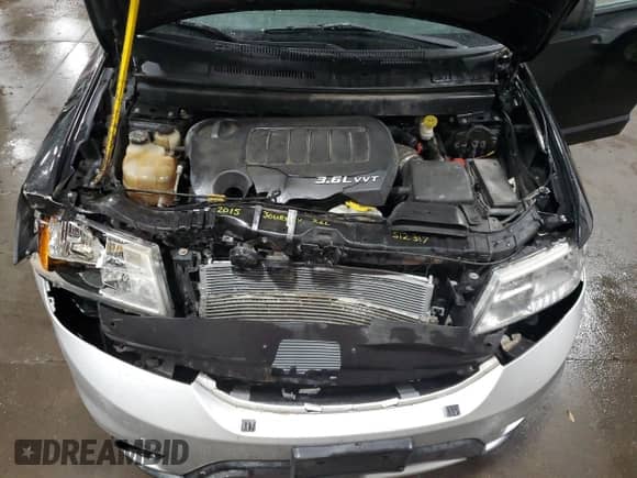 2013 Dodge Journey Crew with VIN 3C4PDDDG5DT548182, listed as a Copart auction lot 59272015 with 239,803 mi miles and Salvage title. Bid and sale history available at DreamBid. Image 12.