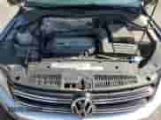 2012 Volkswagen Tiguan S с VIN WVGCV7AX0CW565638, выставлен на аукционе Copart как лот 62784105 с пробегом 120 362 миль миль и Списание • Salvage title. История ставок и продаж доступна на DreamBid. Изображение 11.