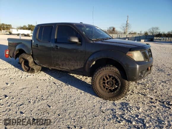 2011 Nissan Frontier SV with VIN 1N6AD0EV2BC435971, listed as a Copart auction lot 42445295 with 143,907 mi miles and Salvage title. Bid and sale history available at DreamBid. Image 4.