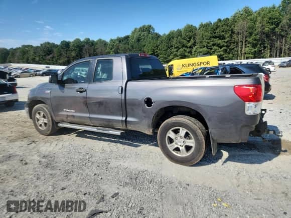2012 Toyota Tundra z VIN 5TFRY5F13CX123560, wystawiony jako Copart lot #71097505 z przebiegiem 190 171 mil mil oraz Szkoda całkowita • Salvage title. Historia ofert i sprzedaży dostępna na DreamBid. Obrazek 2.