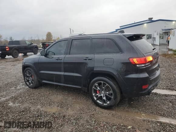 2016 Jeep Grand Cherokee SRT с VIN 1C4RJFDJXGC343157, выставлен на аукционе Copart как лот 89439415 с пробегом 76 190 миль миль и Списание • Salvage title. История ставок и продаж доступна на DreamBid. Изображение 2.