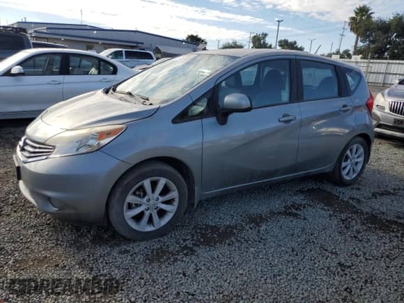 2014 Nissan Note S with VIN 3N1CE2CP9EL357628, listed as a Copart auction lot 81619725 with 104,060 mi miles and Salvage title. Bid and sale history available at DreamBid. Image 1.