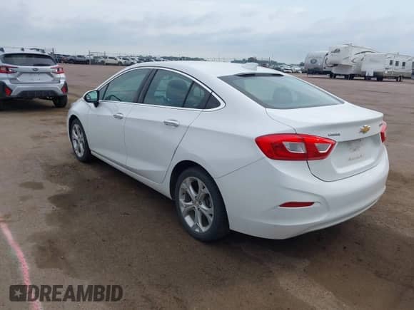 2016 Chevrolet Cruze Premier z VIN 1G1BG5SM1G7274366, wystawiony jako IAAI lot #42985881 z przebiegiem 158 191 mil mil oraz . Historia ofert i sprzedaży dostępna na DreamBid. Obrazek 3.