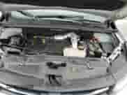 2022 Chevrolet Trax LS z VIN KL7CJKSM3NB544085, wystawiony jako Copart lot #68009885 z przebiegiem 65 581 mil mil oraz Szkoda całkowita • Salvage title. Historia ofert i sprzedaży dostępna na DreamBid. Obrazek 11.