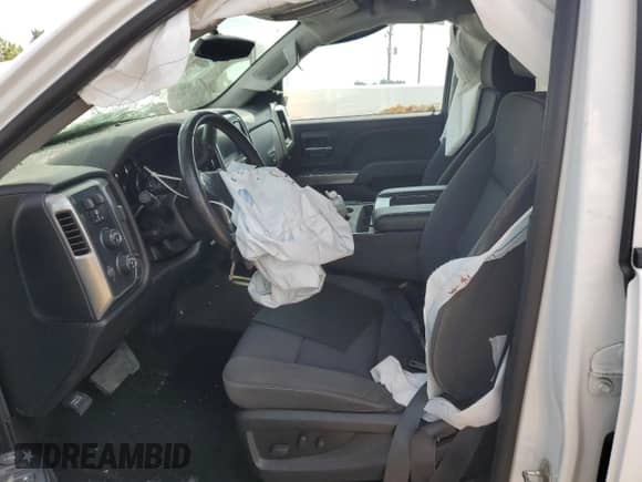 2018 Chevrolet Silverado 1500 LT with VIN 1GCVKREC8JZ297474, listed as a Copart auction lot 67823335 with 73,488 mi miles and Clean title. Bid and sale history available at DreamBid. Image 7.