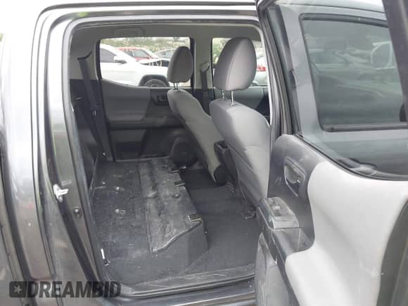 2023 Toyota Tacoma SR with VIN 3TMCZ5ANXPM538495, listed as a IAAI auction lot 42993850 with 41,728 mi miles and . Bid and sale history available at DreamBid. Image 8.