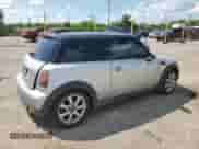 2007 MINI Hardtop with VIN WMWMF33597TT56851, listed as a Copart auction lot 68785325 with 140,683 mi miles and Salvage title. Bid and sale history available at DreamBid. Image 3.