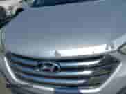 2013 Hyundai Santa Fe Sport z VIN 5XYZT3LB6DG010111, wystawiony jako IAAI lot #43211786 z przebiegiem 148 045 mil mil oraz . Historia ofert i sprzedaży dostępna na DreamBid. Obrazek 6.