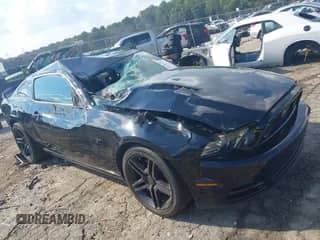 2013 Ford Mustang GT Premium z VIN 1ZVBP8CFXD5263279, wystawiony jako IAAI lot #43148570 z przebiegiem 87 981 mil mil oraz . Historia ofert i sprzedaży dostępna na DreamBid. Obrazek 1.