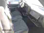 1999 GMC Sierra 1500 SLE with VIN 1GTEC14VXXZ504389, listed as a IAAI auction lot 43139898 with 190,389 mi miles and . Bid and sale history available at DreamBid. Image 5.